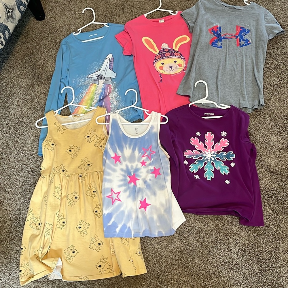 Lot of girls shirts and dress. Fits size 8/10